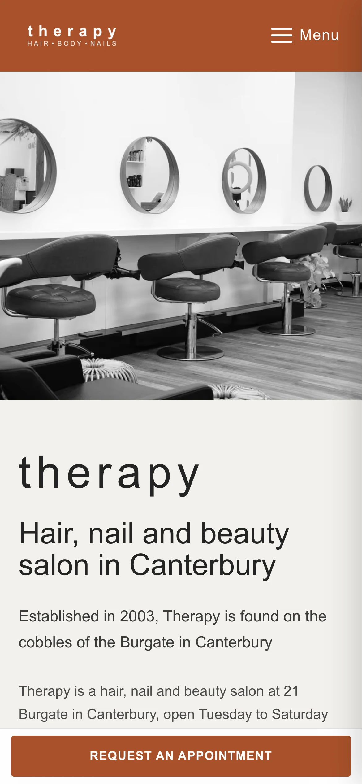 Therapy Hair Body & Nails website, home page on a phone