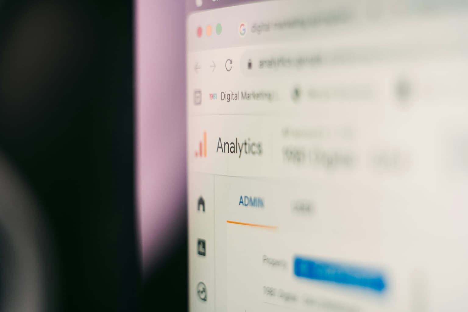 A close-up of a computer screen showing a Google Analytics admin dashboard open in a browser tab.